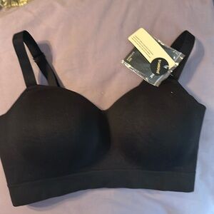 Brand new with tags wire free bra. Includes extender.